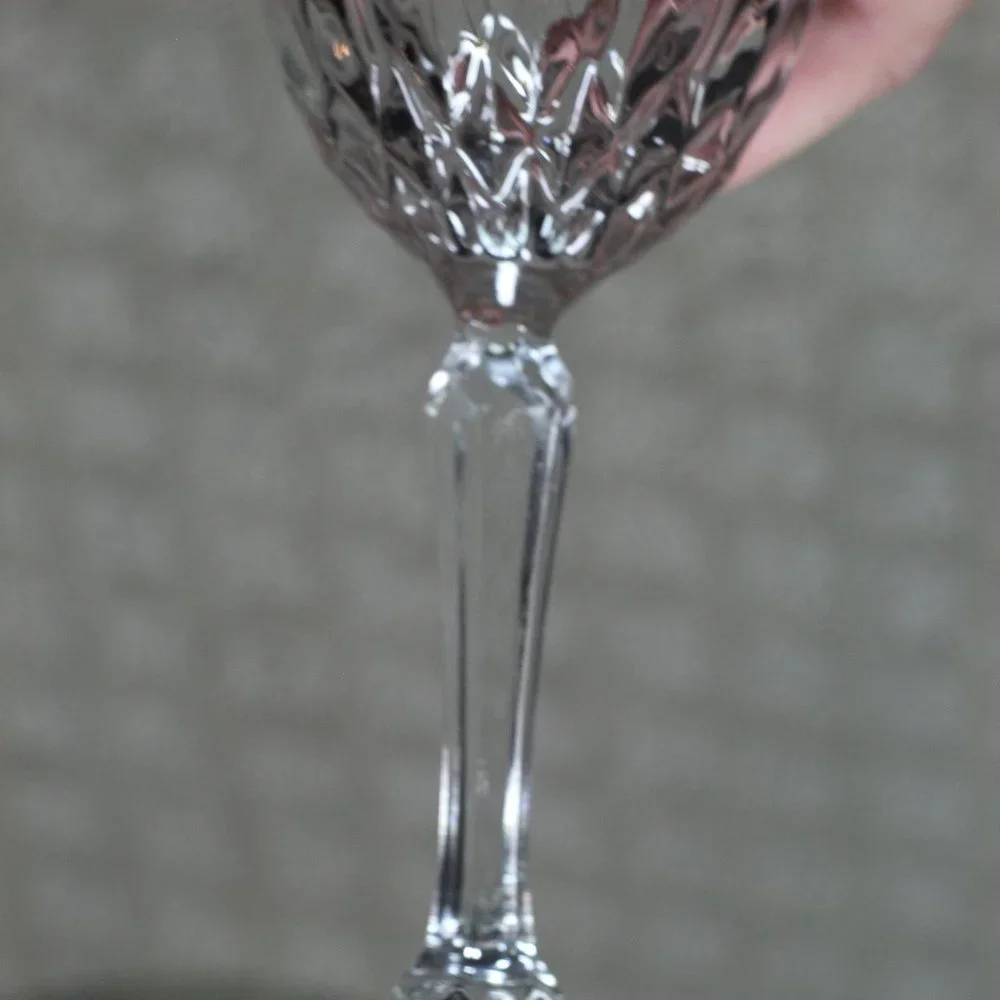 Elegant set of two stemmed cut glass wine glasses